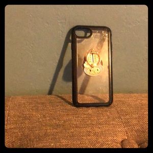 Clear phone case with black outline and pop socket